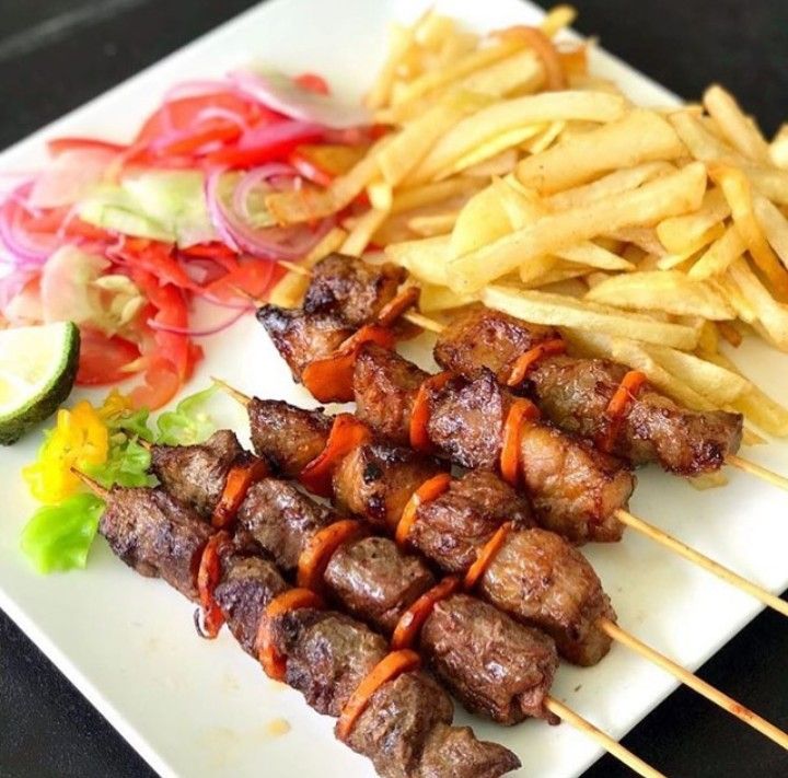 Freshly plated grilled dish with sides